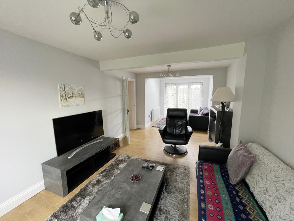 Lot: 57 - THREE-BEDROOM TERRACE HOUSE FOR REPAIR IN POPULAR ESSEX VILLAGE - Living room